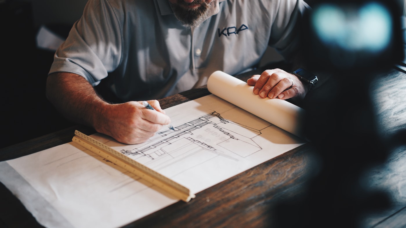 Contractor reviewing project drawings before starting a renovation.